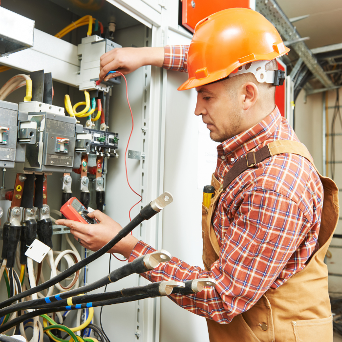 Man working as electrician. Ohio electrician career.